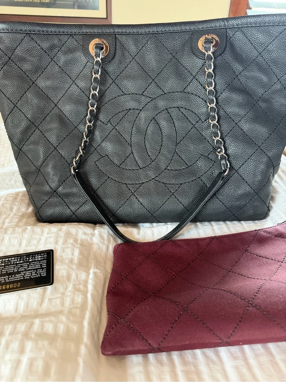 Chanel Black Caviar Leather Shopper Tote with pouch.